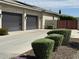 Home featuring a large driveway with garage and privacy gate, providing ample parking at 2735 E King Bird Dr, Gilbert, AZ 85297