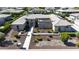 A modern home boasts a beautifully landscaped front yard with pavers leading to the front door at 2735 E King Bird Dr, Gilbert, AZ 85297