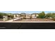 A beautifully landscaped front yard with pavers leading to the contemporary home at 2735 E King Bird Dr, Gilbert, AZ 85297