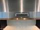 Close-up of KitchenAid stainless steel range hood at 2735 E King Bird Dr, Gilbert, AZ 85297