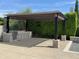 Outdoor kitchen and bar with a built-in grill, perfect for entertaining by the pool at 2735 E King Bird Dr, Gilbert, AZ 85297
