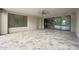 The covered patio boasts tile flooring, ample space, and provides a seamless transition to the outdoor living area at 2735 E King Bird Dr, Gilbert, AZ 85297