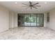 The covered patio has tile flooring, ceiling fan and sliding glass doors offering easy access to the backyard at 2735 E King Bird Dr, Gilbert, AZ 85297