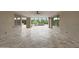 The open-air patio offers seamless indoor-outdoor living with tile flooring and views of the backyard at 2735 E King Bird Dr, Gilbert, AZ 85297