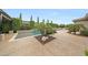 Relaxing pool with a spa is enhanced by lush landscaping for added privacy and natural beauty at 2735 E King Bird Dr, Gilbert, AZ 85297