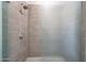 Tiled shower stall with a clear glass door and chrome shower fixtures at 2735 E King Bird Dr, Gilbert, AZ 85297