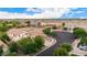Scenic aerial view of a residential neighborhood with well-maintained homes, lush landscaping, and wide, clean streets at 2851 E Alexander Ct, Gilbert, AZ 85298