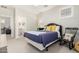 Bedroom with modern decor, a door to the ensuite, an abundance of natural light and room to relax at 2851 E Alexander Ct, Gilbert, AZ 85298