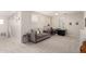 Bright bonus room with a work station, comfortable seating and natural light with ample room for activities at 2851 E Alexander Ct, Gilbert, AZ 85298