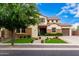 Charming two-story home with manicured landscaping, stone accents, and a welcoming entrance at 2851 E Alexander Ct, Gilbert, AZ 85298