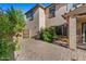 Spacious backyard with a brick-paved patio and lovely desert landscaping at 2868 E Binner Dr, Chandler, AZ 85225