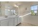 Bright bathroom features a double sink vanity and a window for natural light at 2868 E Binner Dr, Chandler, AZ 85225