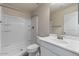 Bathroom featuring a shower with shelving, a toilet, and a sink with white cabinets below at 2868 E Binner Dr, Chandler, AZ 85225