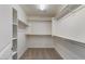 Walk-in closet with shelving and carpeted flooring at 2868 E Binner Dr, Chandler, AZ 85225
