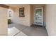 Close up of the front entrance showing the storm door, welcome mat, and a small garden area at 2868 E Binner Dr, Chandler, AZ 85225