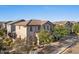 View of the side of the home showing a tiled roof, and view of the well manicured lawn at 2868 E Binner Dr, Chandler, AZ 85225