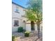 Charming stucco two-story home featuring an arched entryway and a well-maintained, low maintenance front yard at 2868 E Binner Dr, Chandler, AZ 85225
