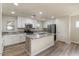 Bright modern kitchen with white cabinetry, granite countertops, and stainless appliances at 2868 E Binner Dr, Chandler, AZ 85225