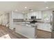 Modern kitchen island with sink, stainless steel appliances, granite countertops, and an island at 2868 E Binner Dr, Chandler, AZ 85225