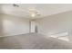 An unfurnished living room featuring carpeted floor, ceiling fan, and natural light at 2868 E Binner Dr, Chandler, AZ 85225