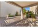 Relaxing covered patio, hardscaped and landscaped for low-maintenance outdoor living at 2868 E Binner Dr, Chandler, AZ 85225