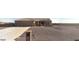 Beautiful single-story home with a desert landscape and a spacious concrete driveway leading to the attached garage at 300 W Quartz Rock Rd, Phoenix, AZ 85085