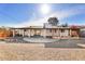 Backyard with gravel, wood fence, and covered patio at 3532 N Carhill Ave, Scottsdale, AZ 85251