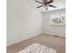 Bedroom with carpet, window, ceiling fan, and white walls at 3532 N Carhill Ave, Scottsdale, AZ 85251
