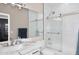 Bathroom featuring marble vanity, brushed nickel faucet, and glass shower doors at 36950 W Mondragone Ln, Maricopa, AZ 85138