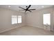 Bright bedroom features hardwood flooring, a ceiling fan, recessed lighting, and windows with modern blinds at 36950 W Mondragone Ln, Maricopa, AZ 85138