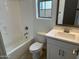 Cozy bathroom with a shower-tub combo, toilet, and a vanity with ample storage at 3738 E Rochelle Cir, Mesa, AZ 85213