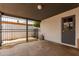 Covered carport with gated access and a convenient entry door to the home at 3828 W Townley Ave, Phoenix, AZ 85051