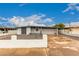 Charming single-story home with a two-car garage and drought-tolerant landscaping at 3828 W Townley Ave, Phoenix, AZ 85051