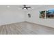Bright bedroom featuring modern flooring and large windows for natural light at 407 E Orion St, Tempe, AZ 85283