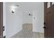 Bright entryway featuring fresh paint, modern flooring, and contemporary light fixtures at 407 E Orion St, Tempe, AZ 85283