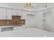 Updated kitchen featuring white cabinets, stainless steel appliances, and modern countertops at 407 E Orion St, Tempe, AZ 85283