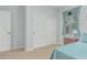 Cozy bedroom with closet, window and bedside table with lamp at 4273 S Red Rock St, Gilbert, AZ 85297
