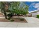Charming single-story home featuring a well-manicured lawn, a two-car garage, and a cozy front porch at 4273 S Red Rock St, Gilbert, AZ 85297