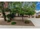 Charming single-story home featuring a well-manicured lawn, a two-car garage, and a cozy front porch at 4273 S Red Rock St, Gilbert, AZ 85297