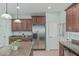 Stylish kitchen featuring stainless steel appliances, granite countertops, and plenty of storage space at 4273 S Red Rock St, Gilbert, AZ 85297