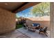 Cozy outdoor patio with stylish seating and string lights, perfect for relaxing outdoors at 4273 S Red Rock St, Gilbert, AZ 85297
