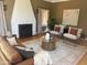 Elegant living room with a striking fireplace, neutral palette, and stylish furnishings at 514 W Monte Vista Rd, Phoenix, AZ 85003