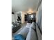 Bright living area featuring stylish decor, including a modern dining set and comfortable seating at 5212 N 42Nd Ln, Phoenix, AZ 85019