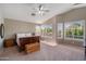 Spacious main bedroom with natural light and shuttered windows at 5402 E Helena Dr, Scottsdale, AZ 85254