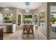 Bright breakfast nook with views of backyard, stylish seating, and natural light creates an inviting space for casual dining at 5402 E Helena Dr, Scottsdale, AZ 85254
