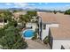 Beautiful home featuring a pool, mature landscaping, and mountain views at 5402 E Helena Dr, Scottsdale, AZ 85254