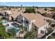 Spacious home featuring a beautiful pool and outdoor seating area at 5402 E Helena Dr, Scottsdale, AZ 85254