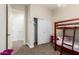 bedroom with bunkbed and closet at 5424 N 186Th Dr, Litchfield Park, AZ 85340