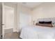 Well-lit bedroom featuring closet and neutral carpet at 5424 N 186Th Dr, Litchfield Park, AZ 85340