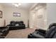 Comfortable living room featuring plush seating and neutral tones, perfect for relaxation at 5424 N 186Th Dr, Litchfield Park, AZ 85340